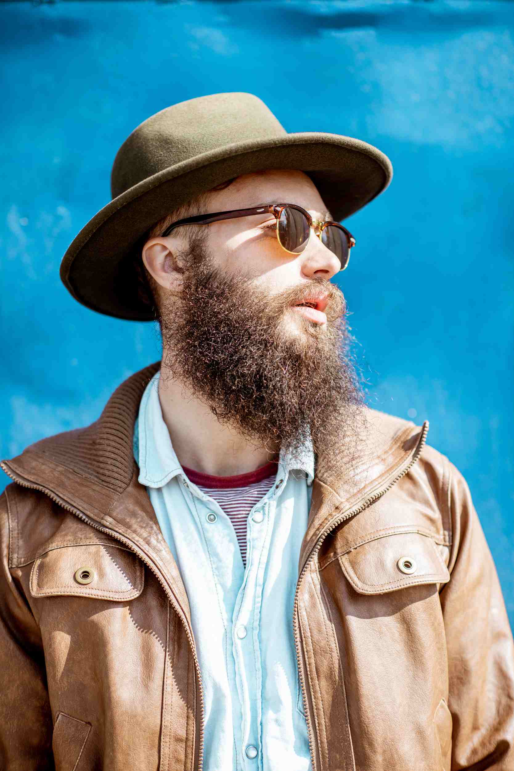 portrait-of-a-stylish-man-on-the-colorful-backgrou-ZXGKRV2.jpg